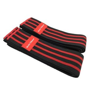 A pair of black and red striped yoga straps.