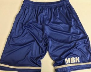 A pair of blue shorts with white trim.