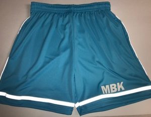 A pair of blue shorts with white trim and initials mbk.