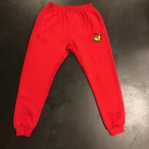 A red sweat pants with a yellow and black bear on the front.