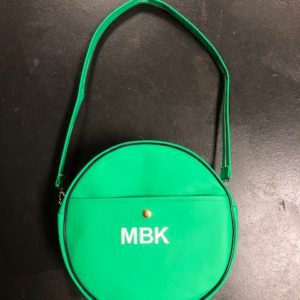 A green bag with the initials mbk on it.